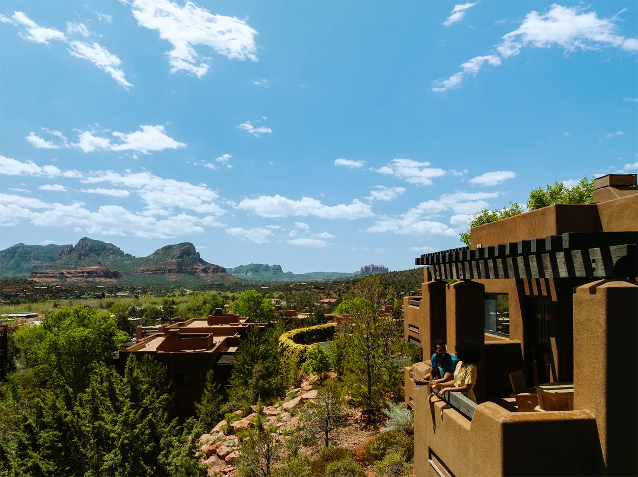 Hotel balcony with mountains in the background