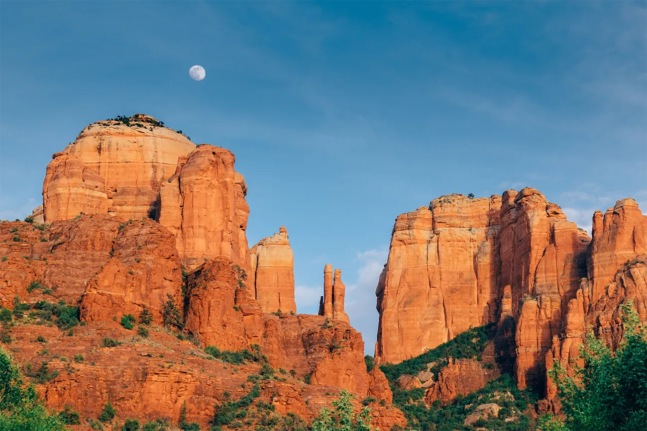 ground level view of Cathedral Rock formation at dusk