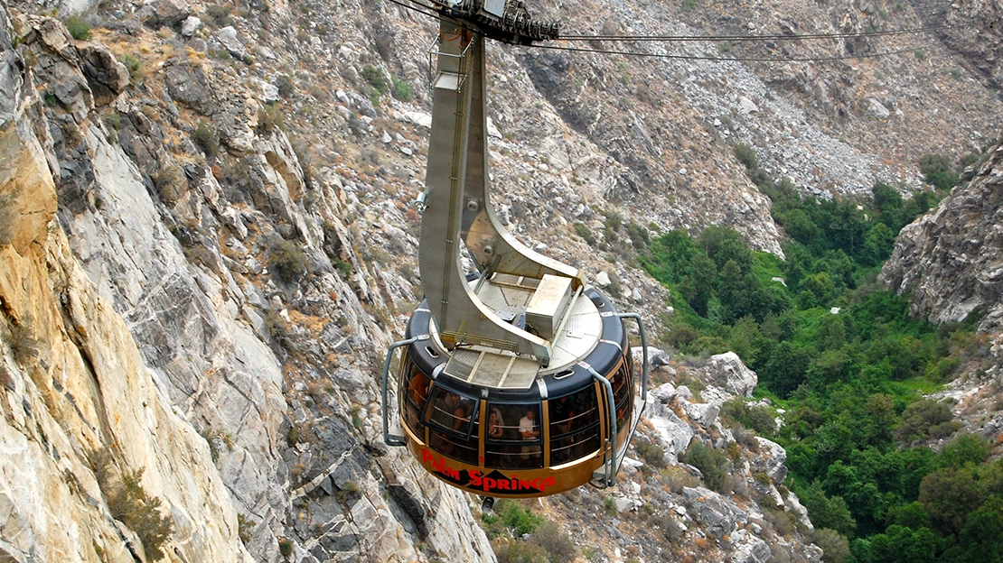 The Palm Springs Aerial Tram making its way across ruggedly scenic desert terrain