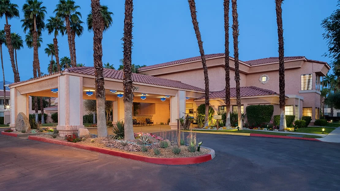 Landscaping and resort entrance at twilight