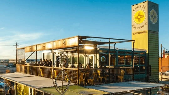 An open-air dining area at the Santa Fe Brewing Company