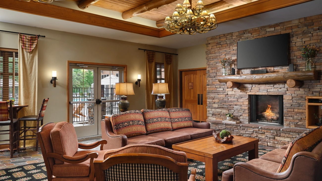 A fire is lit in the cabin-style interior of the lobby